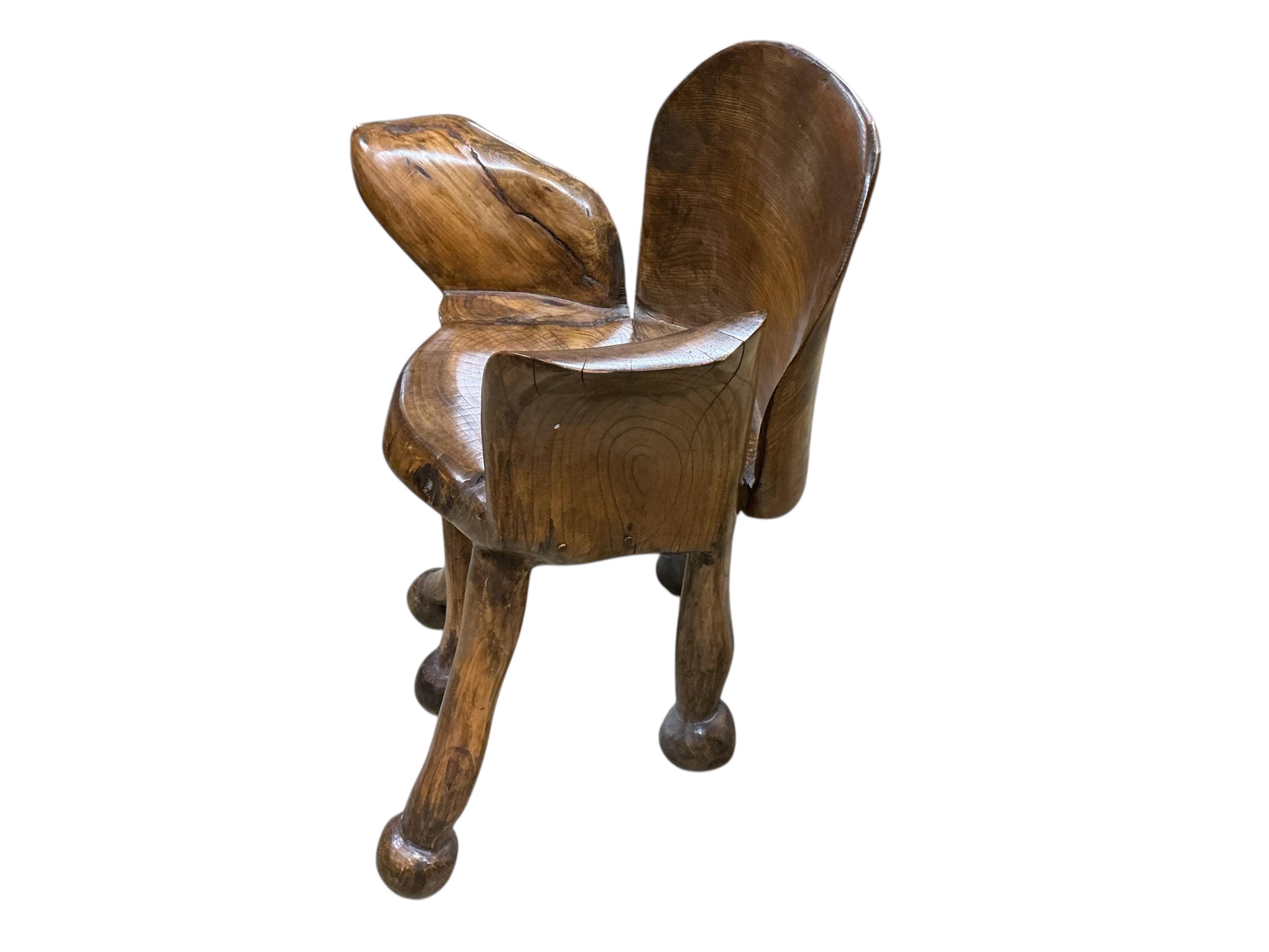 Pierre Decorse (b.1953), a naturalistically modelled elbow chair raised on irregular legs, width 68cm, depth 41cm, height 75cm